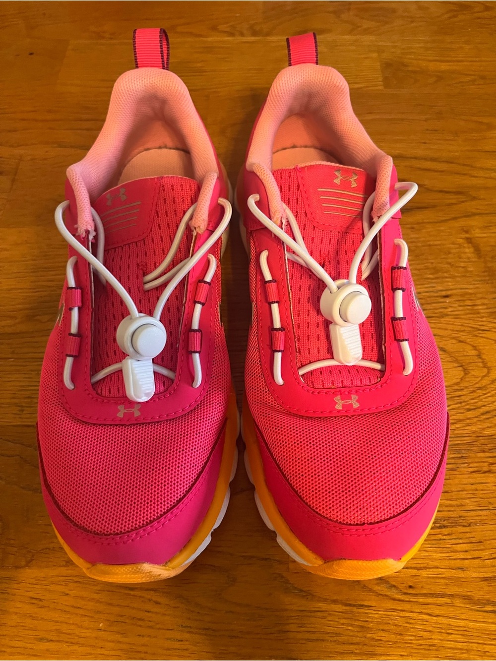 Lightly worn kids under Armour sneakers size 4